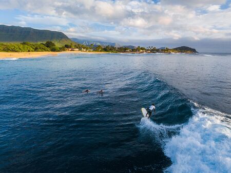 OAHU / USA - 17 NOVEMBER 2018: Panorama of the surf spot Makaha with the surfer riding the wave. Oahu, Hawaiiのeditorial素材