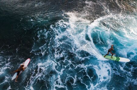 OAHU / USA - 17 NOVEMBER 2018: Aerial view of the surfers in the ocean. Oahu, Hawaiiのeditorial素材