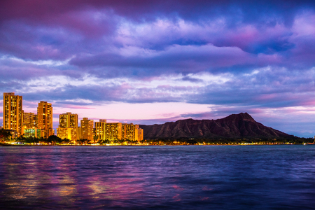 City of Honolulu and Diamond Head volcano at twilight. Oahu, Hawaiiの写真素材