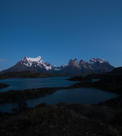 Torres del Paine National Park during the twilight before sunrise with some bright stars in the sky. Chileの写真素材
