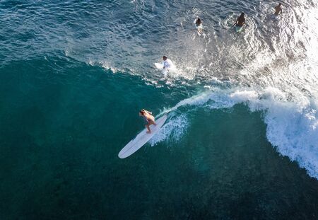 OAHU, HI / USA - NOVEMBER 15, 2018: Aerial top to down view of the Makaha surf spot located on the lee shore of Oahu with lots of surfers in the waterのeditorial素材