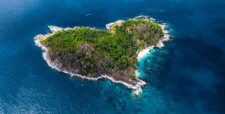 Heart shaped island in the calm tropical sea. Thailandの写真素材