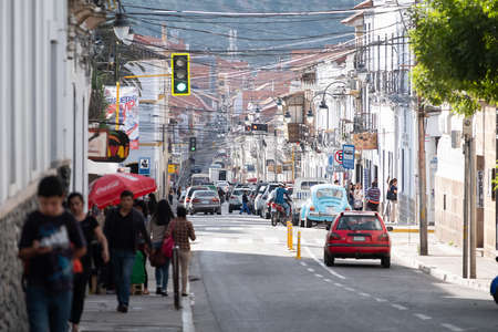 SUCRE / BOLIVIA - APRIL 10, 2018: Street in the city of Sucre in Bolivia filled with bright sunny lightのeditorial素材