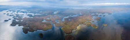 Aerial panorama of the delta of the river of Volga near the village of Karalat, Astrakhan Region, Russiaの写真素材
