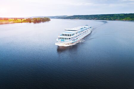 Cruise boat moves along the river of Kama. Russiaの写真素材