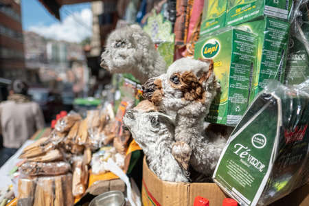 LA PAZ, BOLIVIA - MARCH 24, 2018: Dried llama fetuses and Coca Tea on the Witch Market in the city of La Paz, Boliviaのeditorial素材