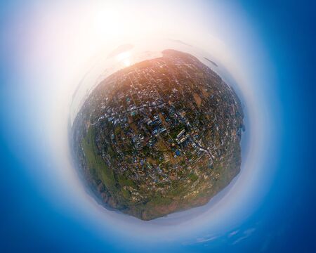 Aerial panorama of the island of Phuket during sunrise in a little planet projection. Thailandの写真素材