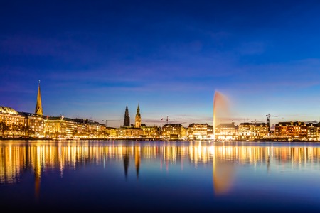 Hamburg Binnenalster and skyline during the twilight hourの写真素材