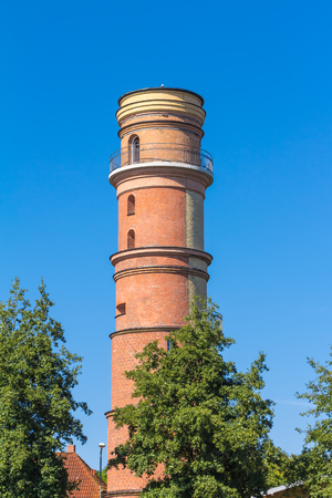 Old lighthouse tower in Travemuende in Germanyの写真素材
