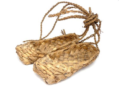 russian bast shoes isolated on whiteの写真素材