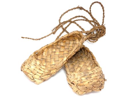 russian bast shoes isolated on whiteの写真素材