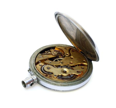 old pocket watch with open cover of gear isolated on whiteの写真素材