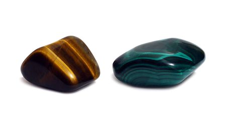 two gem stones - agat and malachite isolated on whiteの写真素材