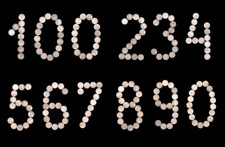 numbers set from 0 to 9 of money coins isolated on blackの写真素材