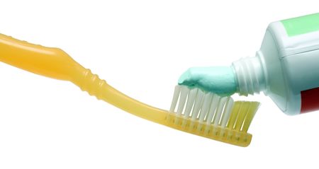 toothbrush with toothpaste isolated on whiteの写真素材