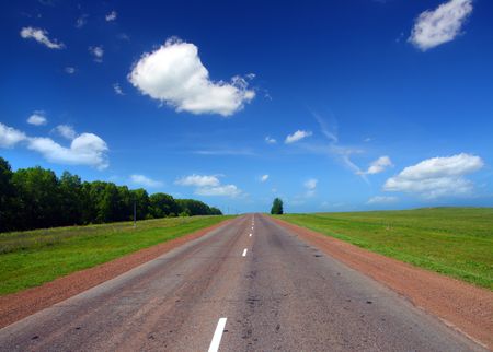 infinity road under blue skyの写真素材
