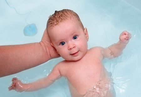 small baby bath in bathtub