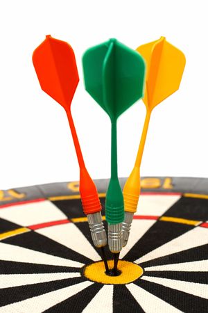 dartboard with darts in aim isolated on whiteの写真素材