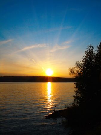 lake landscape in dusk with sunsetの写真素材