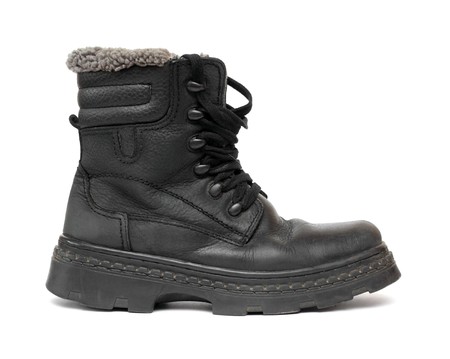 black leather winter shoe isolated on whiteの写真素材
