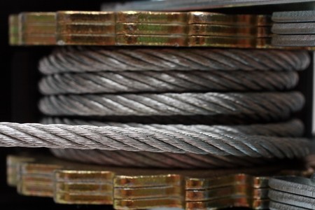 steel rope on spool with ratchet - part of winchの写真素材