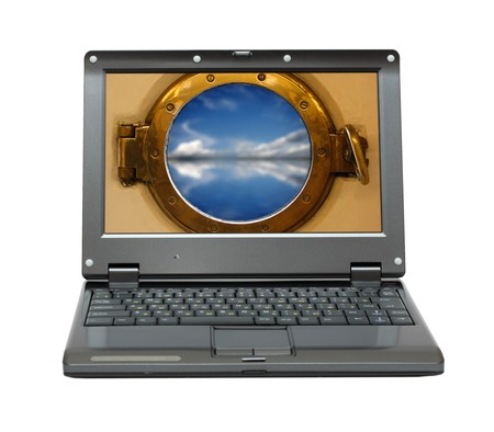 small laptop with nautical porthole on screenの写真素材