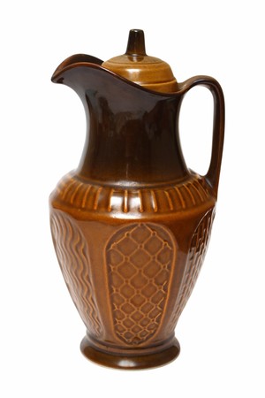 old brown ceramic jug isolated on whiteの写真素材