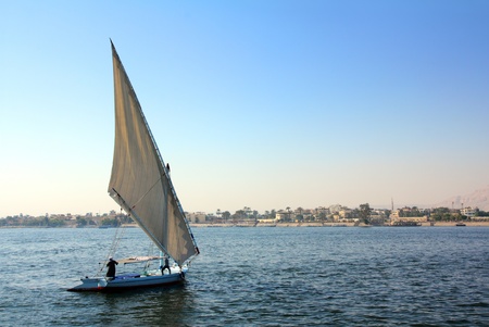sailboat sailing on the Nile River in Egyptの写真素材
