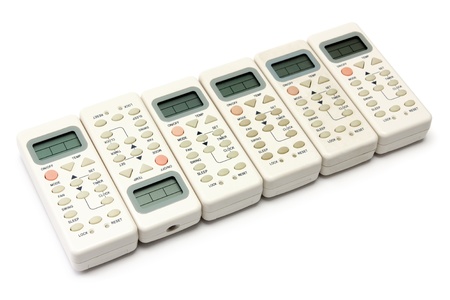 different concept with remote infrared devices isolated on whiteの写真素材