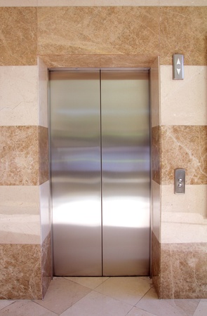empty contemporary interior with elevator steel doorsの写真素材