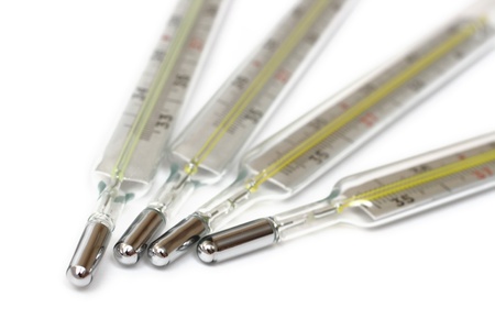 influenza epidemic concept - group of medicine thermometersの写真素材