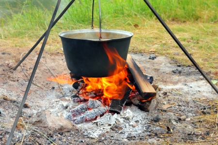 camping - kettle over campfireの写真素材