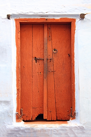 old obsolete wooden closed door in indiaの写真素材