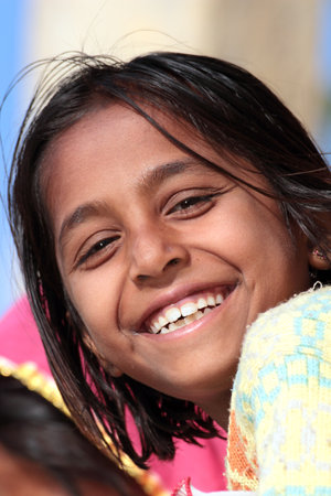 JAISALMER, INDIA - NOVEMBER 28, 2012: Portrait of happy village indian girlのeditorial素材