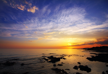 beautiful landscape with sunset over seaの写真素材