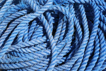 cove of blue marine rope closeup background