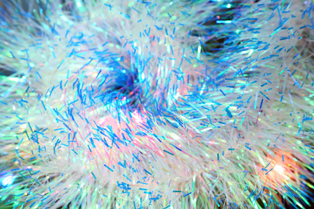 shiny blue Christmas garland closeup backgroundの写真素材