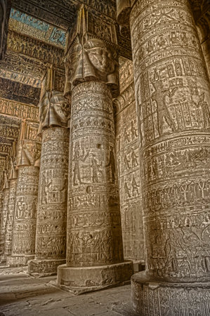 Interior of the painted and carved hypostyle hall at Dendera Temple. Ancient Egyptian temple near Qena. HDR image.のeditorial素材