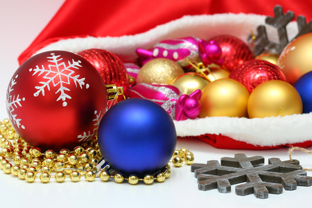 Bright christmas balls, toys in red bagの写真素材