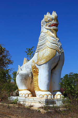 Ancient statue of lion guardian in Shwe Inn Thein Paya temple complex near Inle Lake in central Myanmar (Burma)の写真素材
