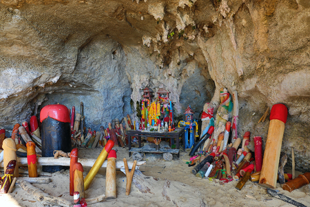 Wooden phalluses in Princess cave (Pranang cave). South Railay beach in Krabi. Thailand. It is believed among villagers the here that the spirit of Pranang (Princess Goddess) resides in this caveの写真素材