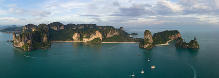 Aerial panorama of tropical turquoise lagoon, beach between rocks and islands, Krabi, Railay and Pranang beach, Thailandの写真素材