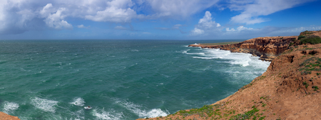 Panorama of ocean waves and rocks on the Atlantic coast in Moroccoの写真素材
