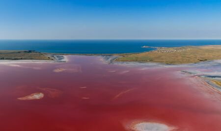 Aerial panorama view of pink lake near Black Sea - Chokrak lake in Karalarsky park, Crimeaの写真素材