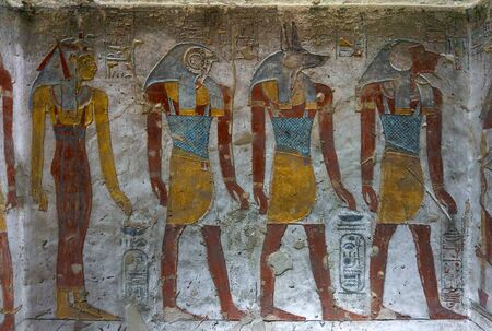 Ancient egypt carving color image on wall of temple in Egyptの写真素材