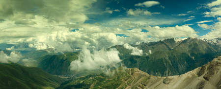 Hills and mountains under cloudsの写真素材