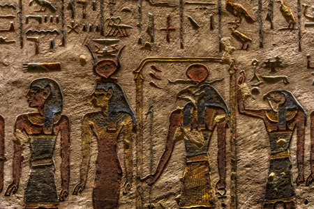 Ancient egypt carving color image on wall of temple in Egyptの写真素材