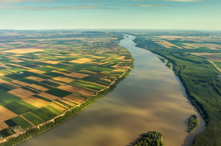 Aerial view of fields on bank of Danubeの写真素材