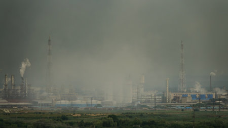Oil and gas refinery plant with chimney smoke, Business petrochemical industrial, power and fuel energy, Ecosystem and healthy environment conceptsの写真素材