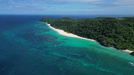 Aerial view of a beautiful quiet tropical sandy beach, Puka Shell Beach, Boracay island, Philippines